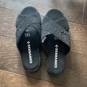 Converse black women’s one star slip on sandals.